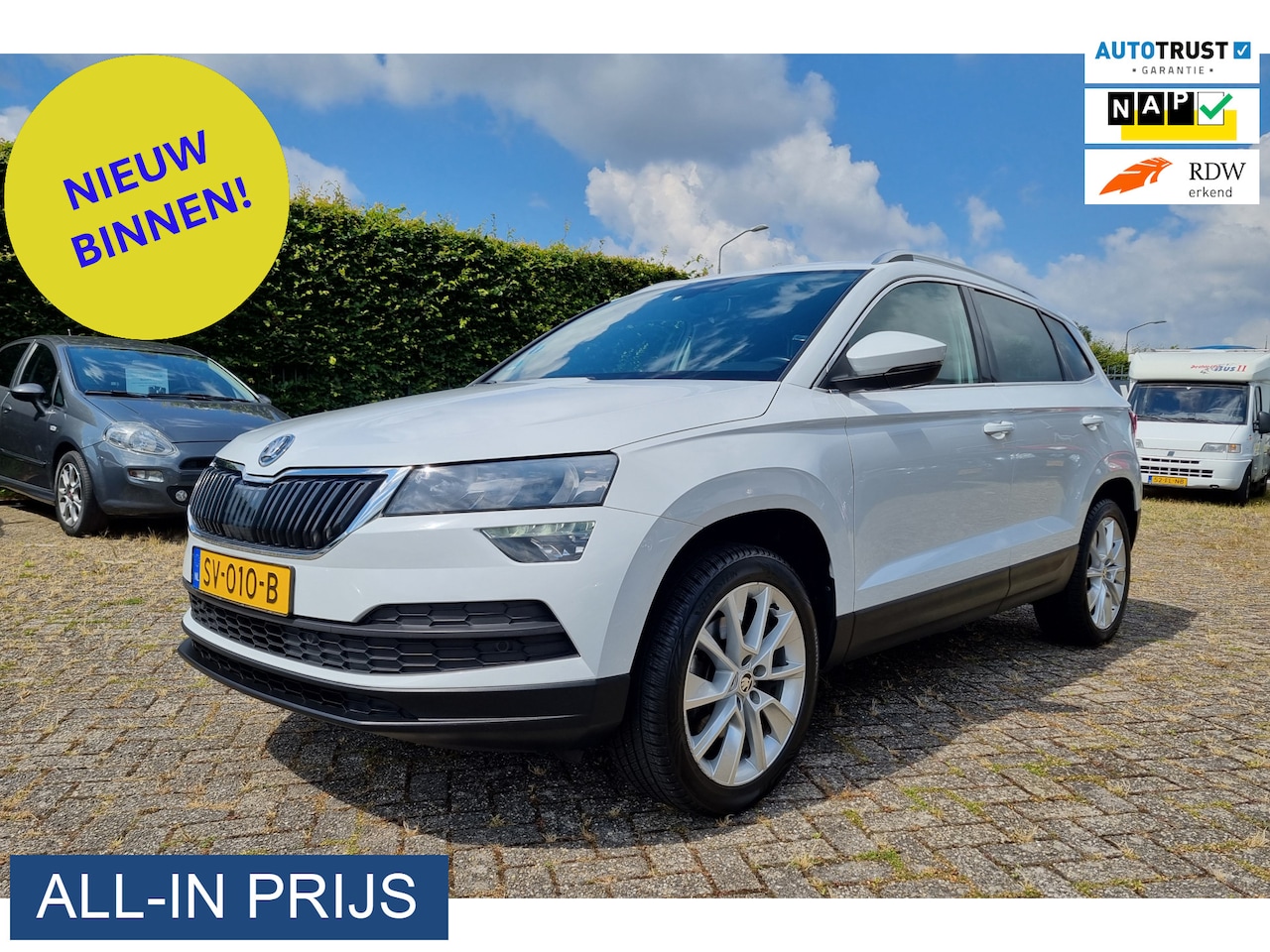 Skoda Karoq - 1.0 TSI Ambition Business ✅NETTE AUTO ✅CARPLAY ✅TREKHAAK - AutoWereld.nl