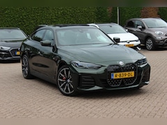 BMW i4 - eDrive40 High Executive 84 kWh / SoH 99% / Trekhaak / Schuifdak / Camera / Head-up / Leder
