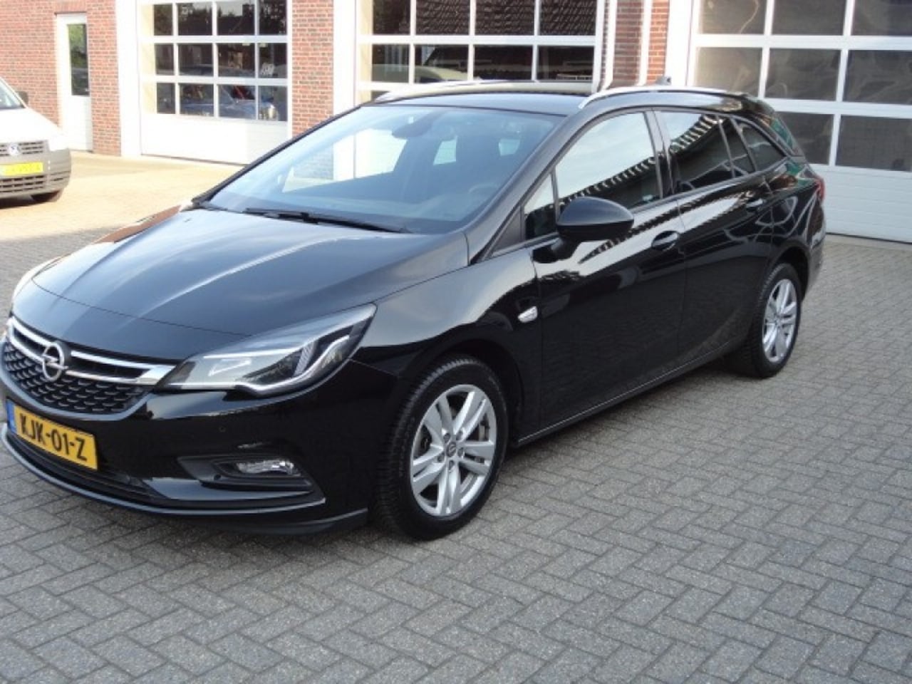 Opel Astra Sports Tourer - Sports Tourer 1.4 Turbo Autom. Navi Pdc - AutoWereld.nl