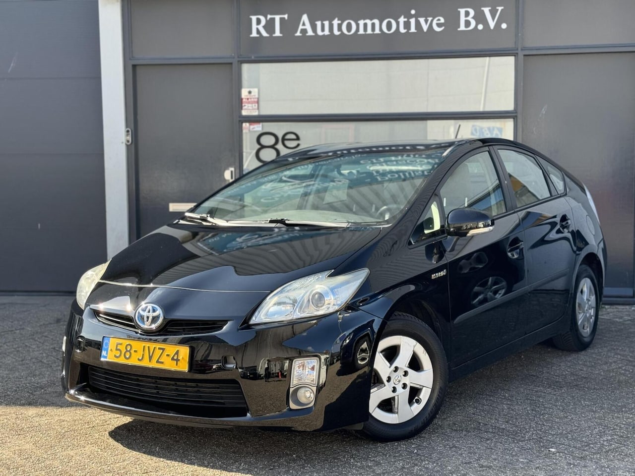 Toyota Prius - 1.8 Comfort HUD / Cruise / Clima DealerOH - AutoWereld.nl