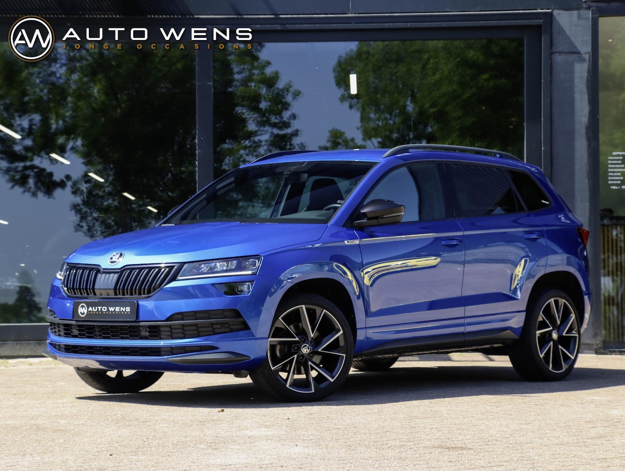 Skoda Karoq - 1.5 TSI ACT Sportline 150PK DSG Camera Navi Stoel/Stuurverw. Race Blue 19 inch - AutoWereld.nl