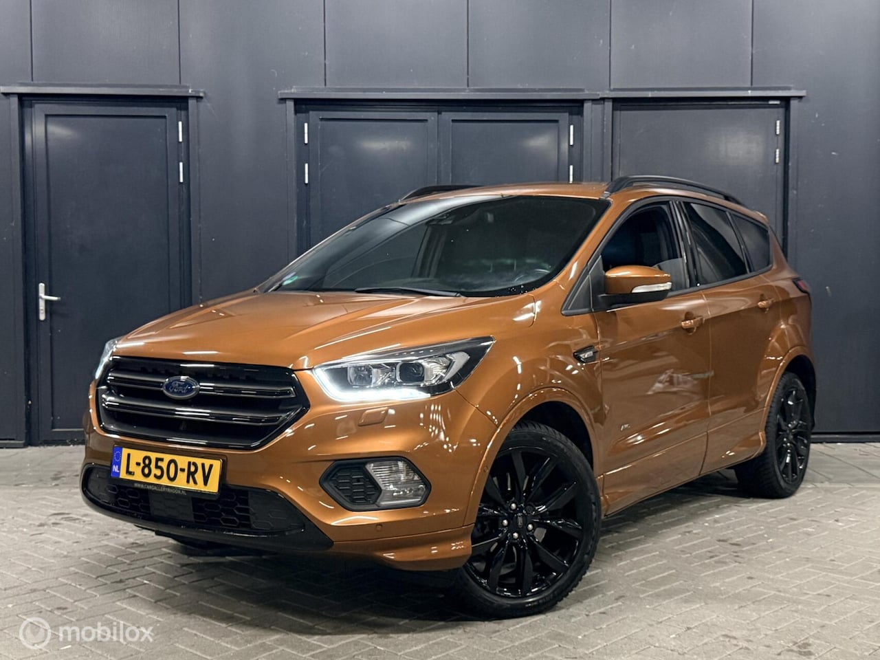 Ford Kuga - 1.5 EcoBoost ST Line AUT/Copper Pulse Metallic/AWD - AutoWereld.nl