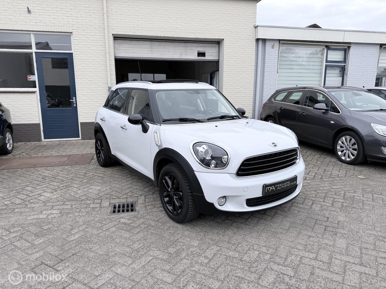 MINI Countryman - 1.6 One Chili|pano|stoelverwarming|sensoren| - AutoWereld.nl