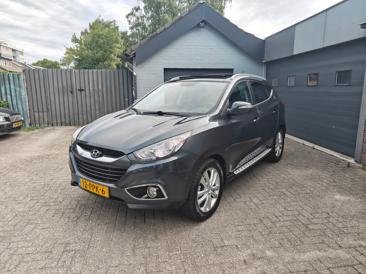 Hyundai ix35 - 2.0i i-Catcher 2.0i i-Catcher,Automaat,Panoramadak,Climate control,Cruise control,Achteruitrij camera,Tre - AutoWereld.nl