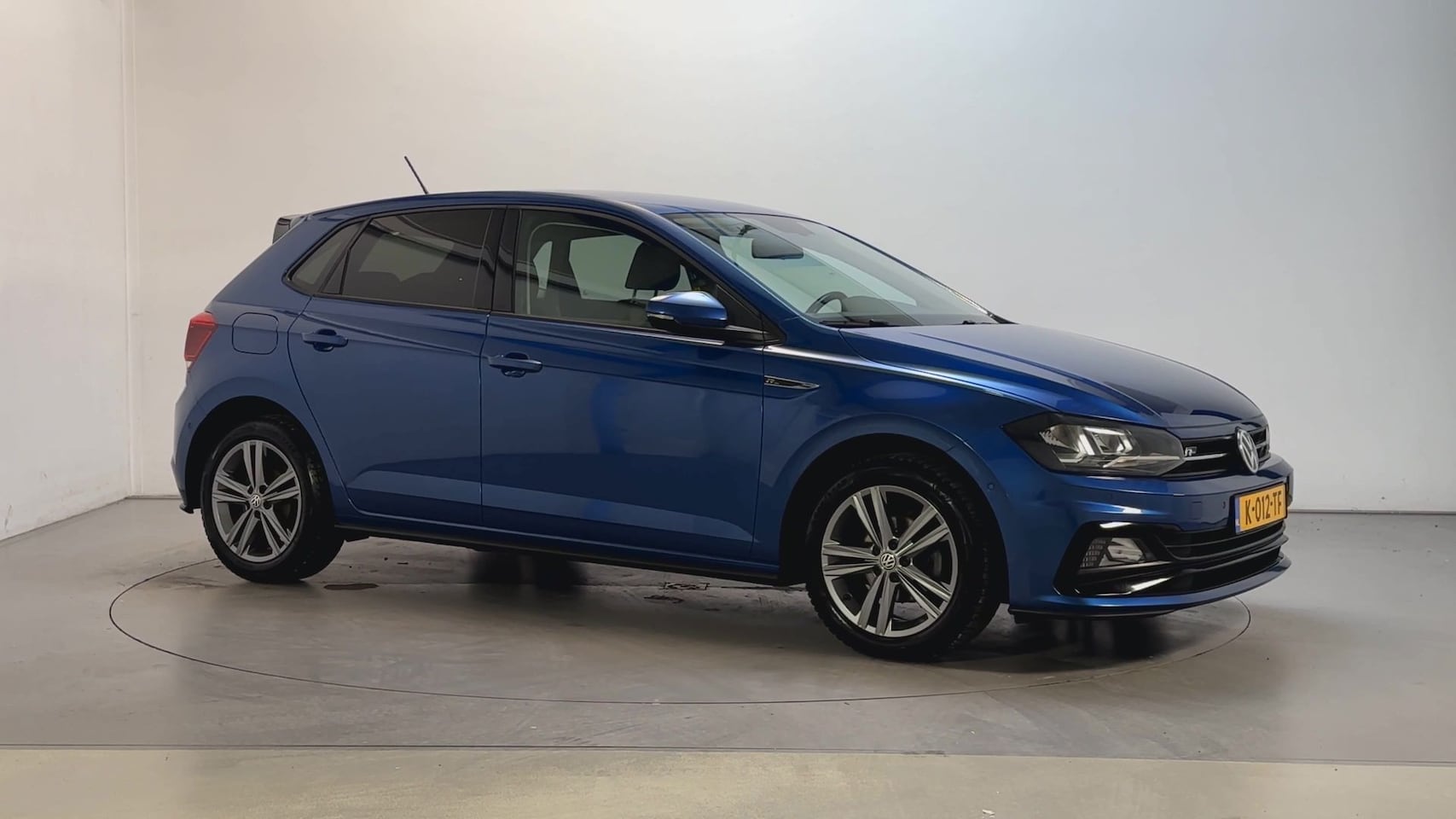Volkswagen Polo - 1.0 TSI Highline Business R R-Line Parkeersensoren Navigatie Climate Control - AutoWereld.nl
