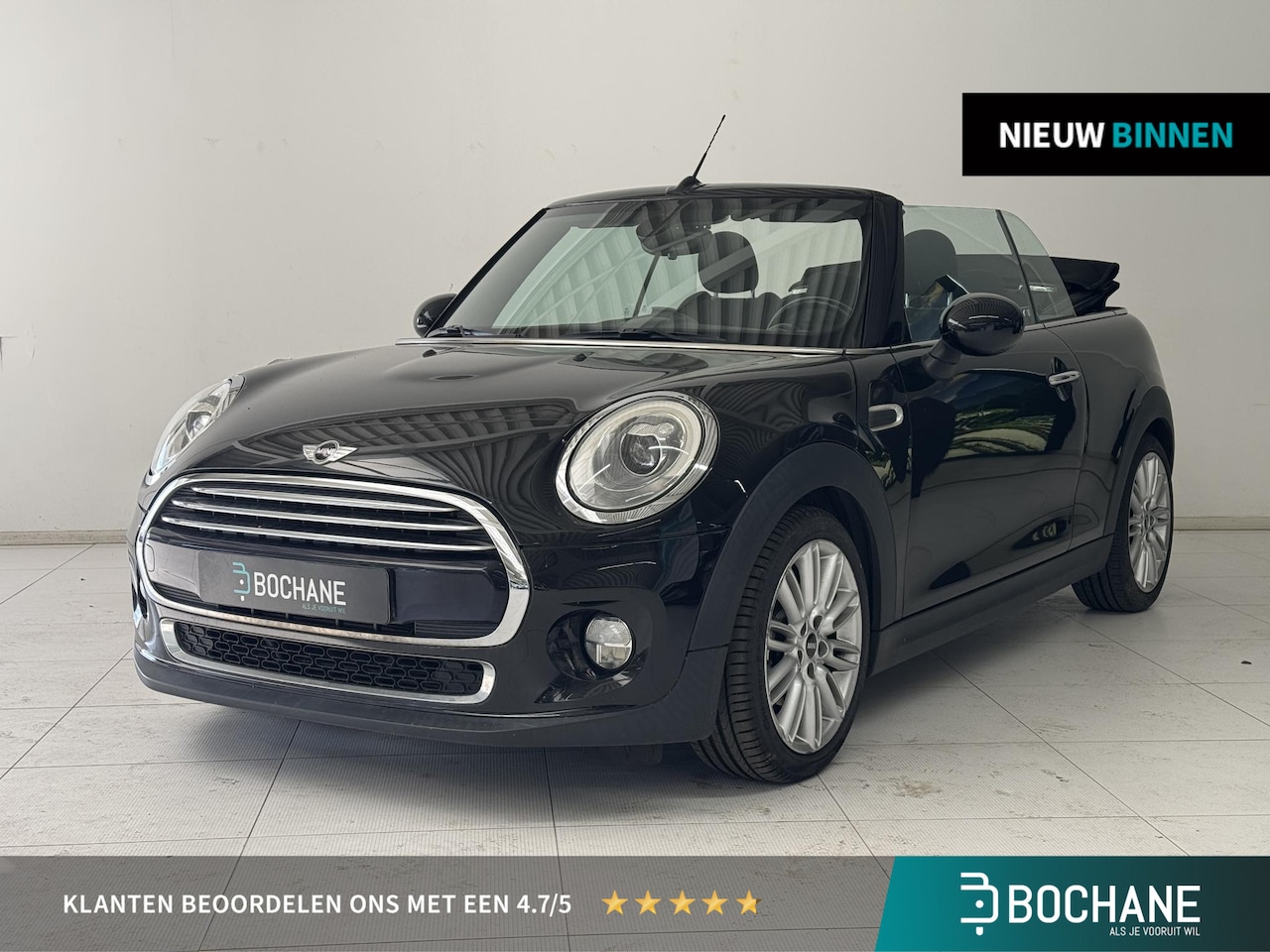 MINI Cabrio - 1.5 Cooper Chili Serious Business | Navigatie | Parkeersensoren | Stoelverwarming | Cruise - AutoWereld.nl