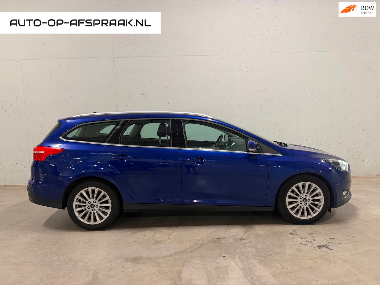 Ford Focus Wagon - 1.5 TDCI Titanium Navi Clima Cruise - AutoWereld.nl