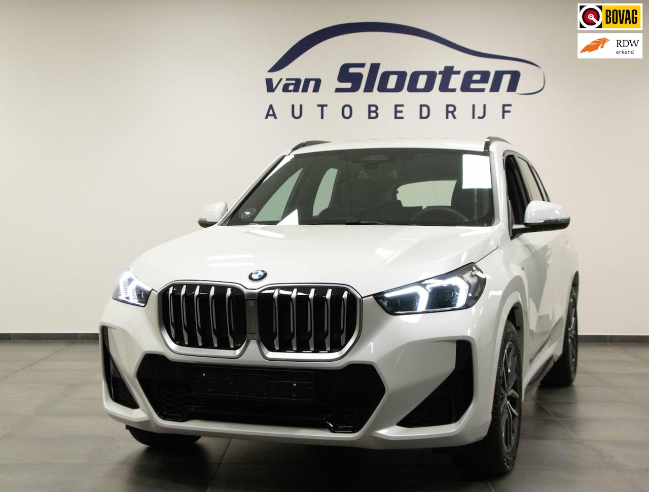 BMW X1 - SDrive18i M-Sport | Navi| Camera| Electrische achterklep| Stoel Verwarming - AutoWereld.nl