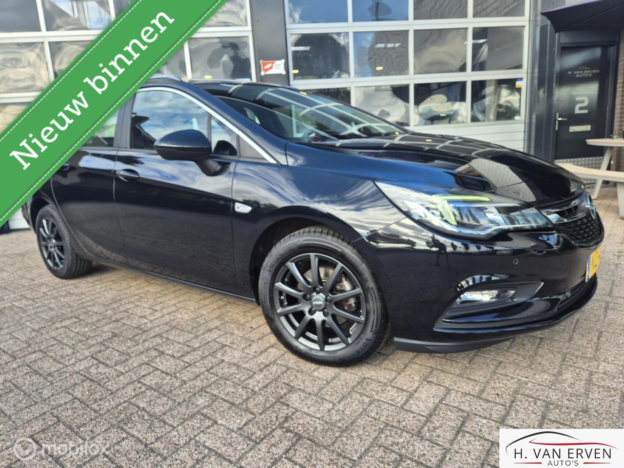 Opel Astra Sports Tourer - 1.4 NAVI XENON LED PDC CAMERA NAP - AutoWereld.nl