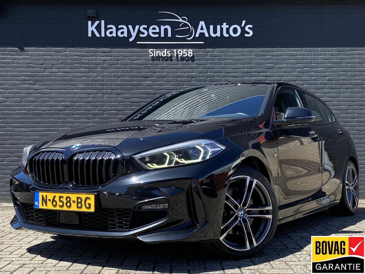 BMW 1-serie - 118i M-Sport 136 pk AUT. | 1e eigenaar | dealer onderh. | navigatie | leder sportstoelen | - AutoWereld.nl