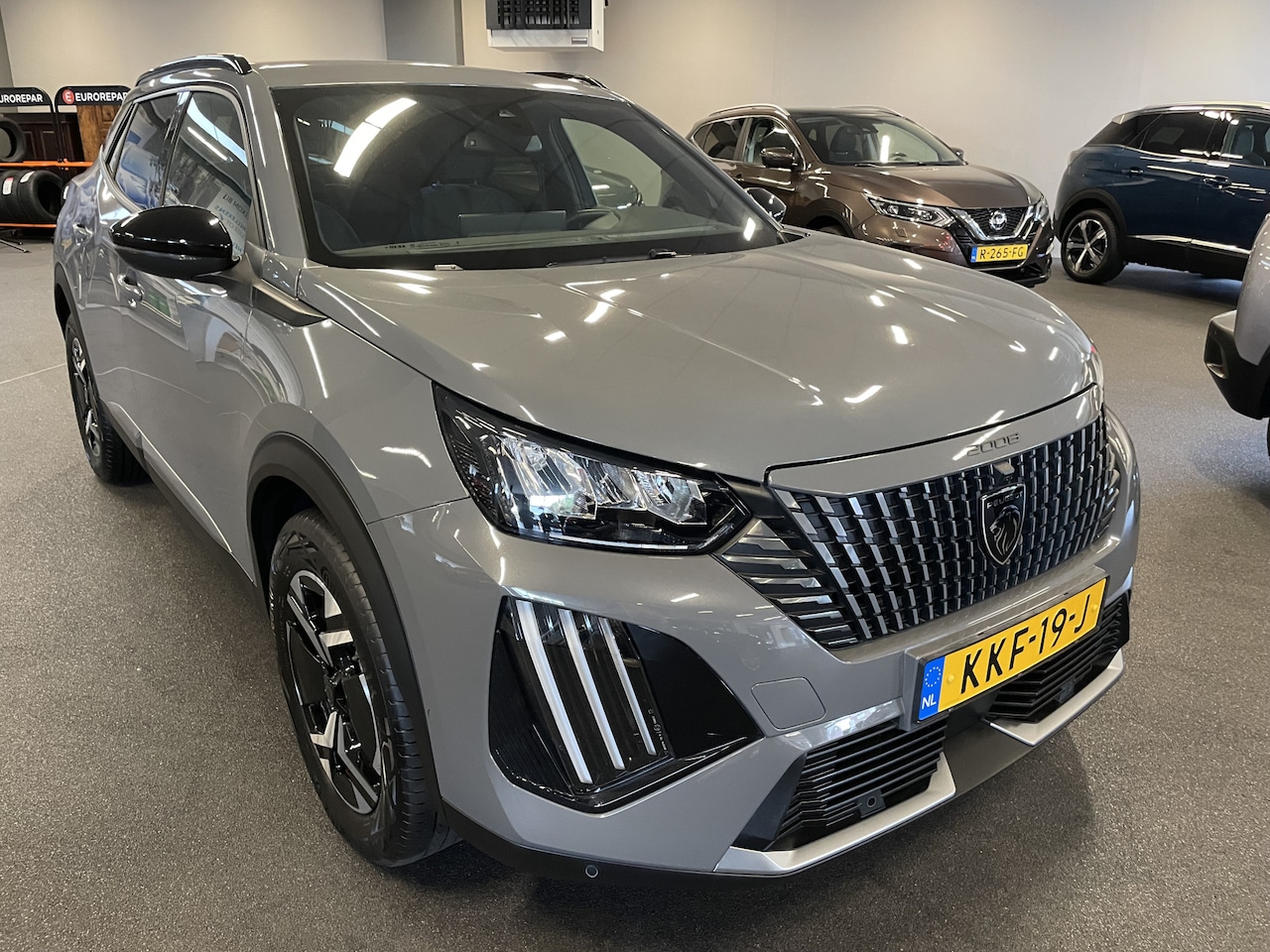 Peugeot 2008 - 1.2 Hybrid 136 ALLURE NAVIGATIE-ACHTERUITRIJCAMERA-DRAADLOZE TELEFOONLADER-KEYLESS ENTRY-C - AutoWereld.nl