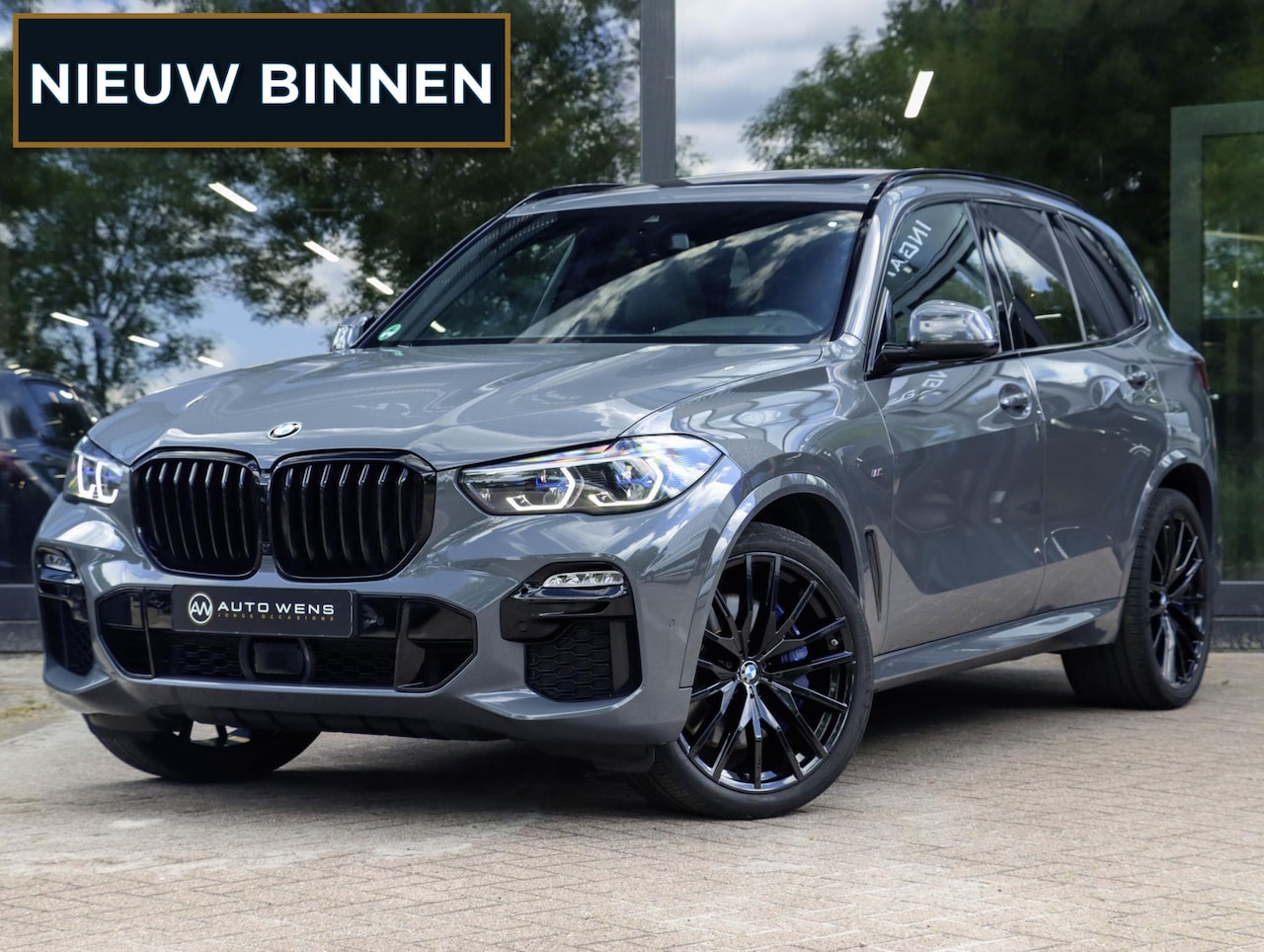 BMW X5 - M50i 4.4 530pk | Achterasbesturing | Laser | ACC | Sky Lounge | Grigrio Telesto - AutoWereld.nl