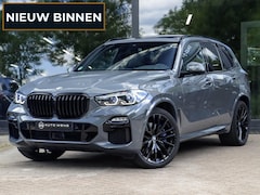 BMW X5 - M50i 4.4 530pk | Achterasbesturing | Laser | ACC | Sky Lounge | Grigrio Telesto