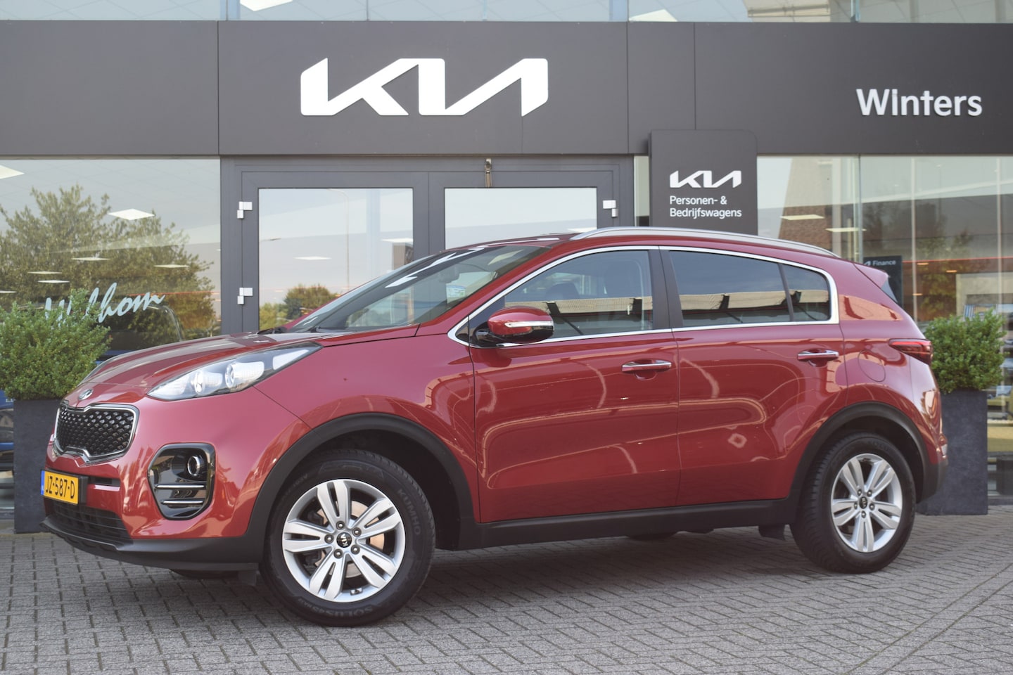 Kia Sportage - 1.6 GDI First Edition | Trekhaak | Leder | Navigatie | Climate & Cruise Control | PDC | LE - AutoWereld.nl