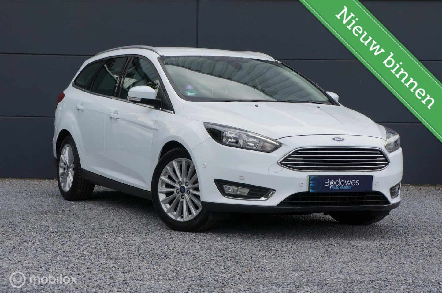 Ford Focus Wagon - 1.0 Titanium Edition Nav Cruise PDC Nw Dist - AutoWereld.nl