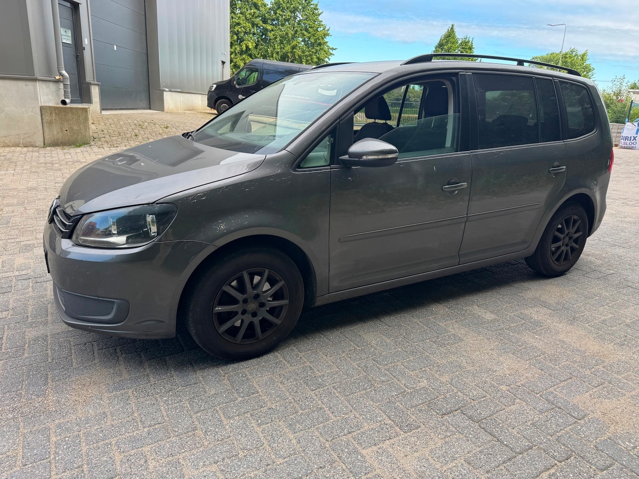 Volkswagen Touran - 1.6 TDI Comfortline BlueMotion 7p. Navi Clima APK - AutoWereld.nl