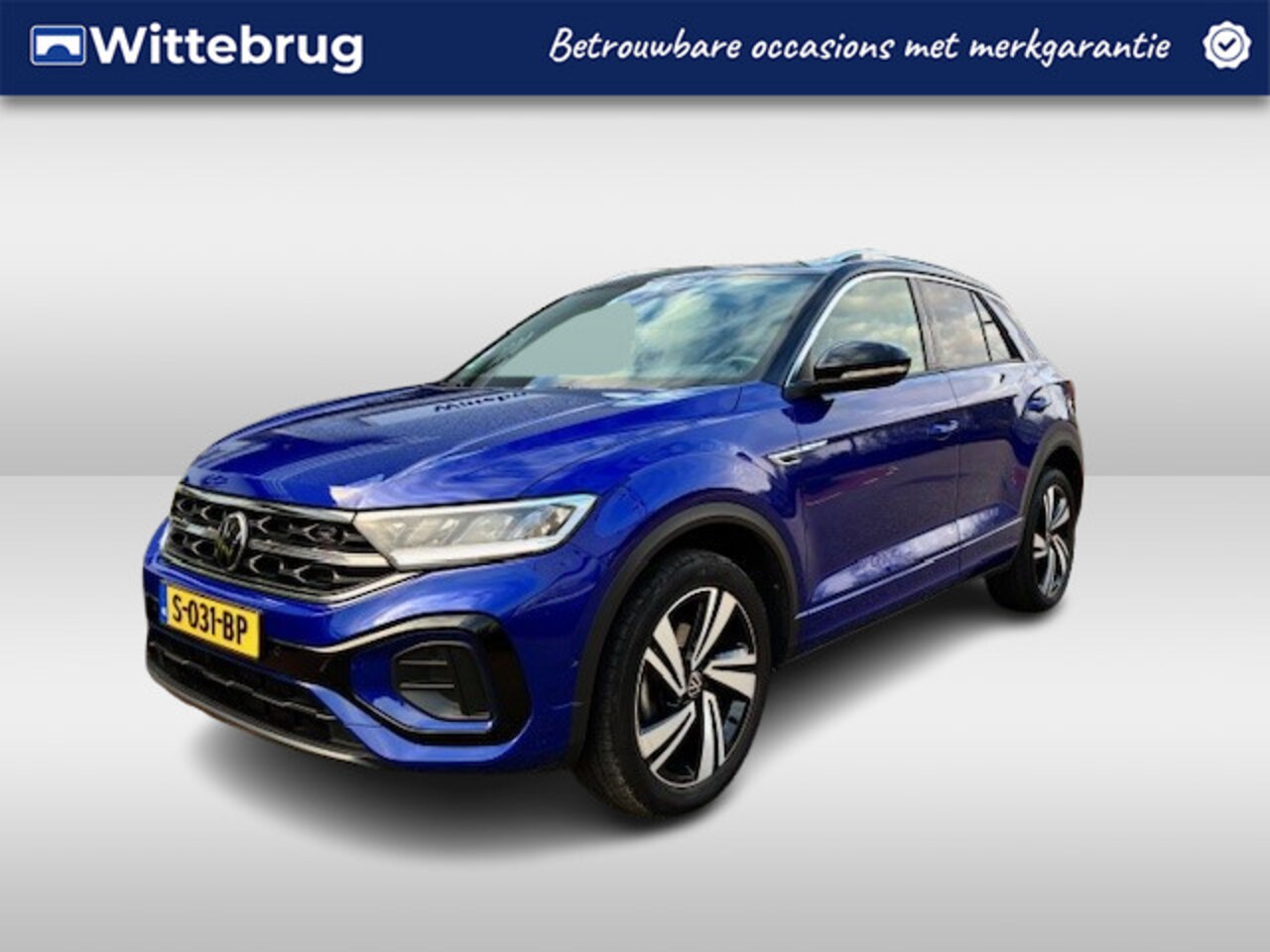 Volkswagen T-Roc - 1.5 TSI R-Line / Navi / Carplay / Trekhaak afneembaar / Camera / Side assist - AutoWereld.nl