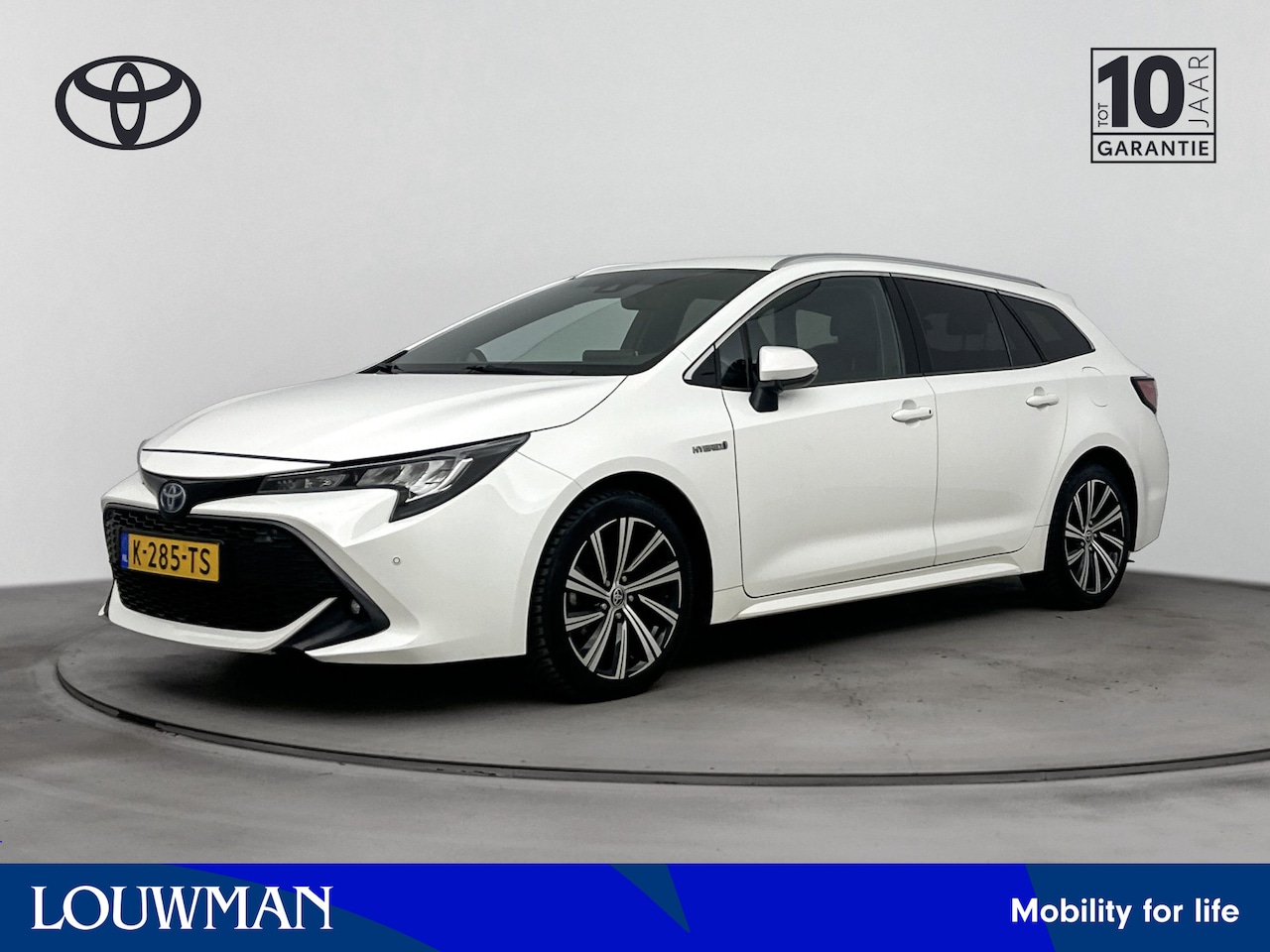 Toyota Corolla Touring Sports - 1.8 Hybrid Business Plus | Parkeersensoren V+A | Stoelverwarming | Onderweg-naar-dealer - AutoWereld.nl