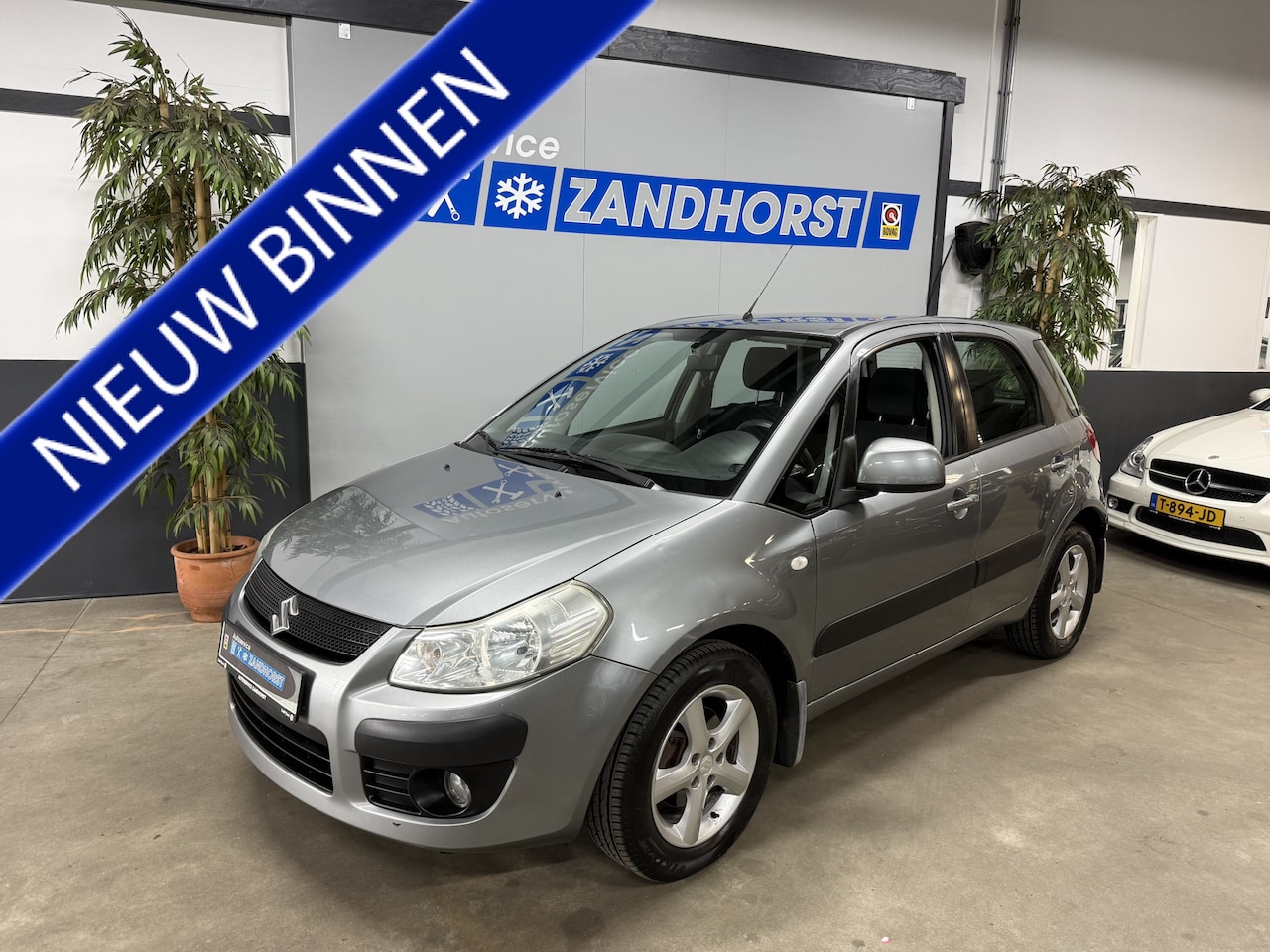 Suzuki SX4 - 1.6 Exclusive // Autom. // Ecc // LM Velgen - AutoWereld.nl