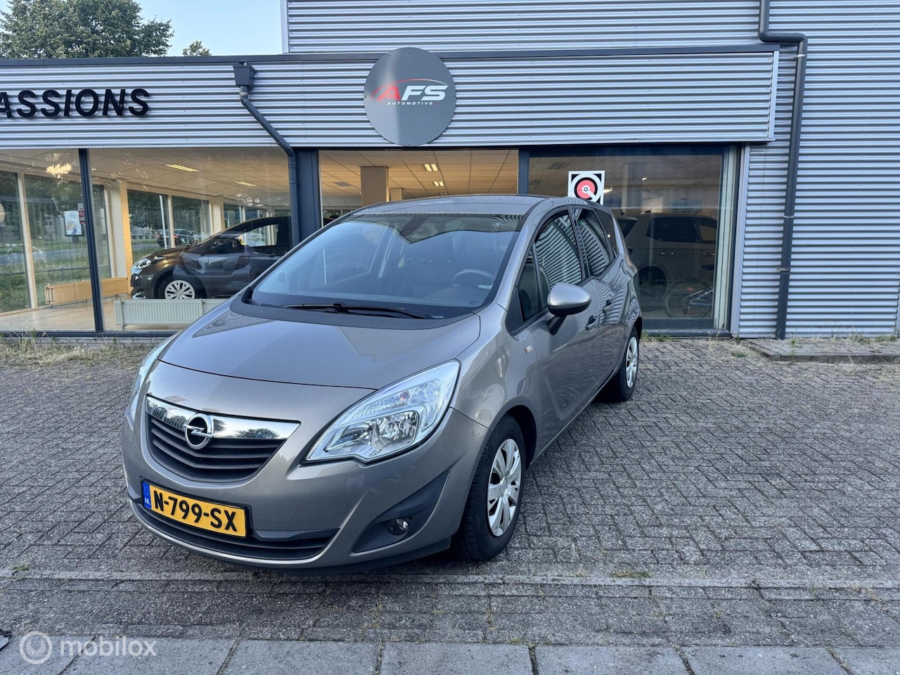 Opel Meriva - 1.4 Turbo Cosmo Airco cruise controle / trekhaak - AutoWereld.nl