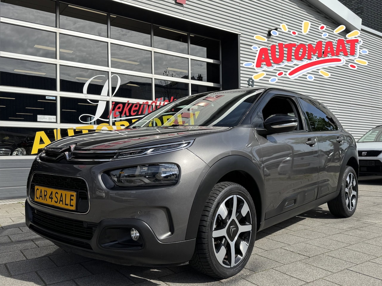 Citroën C4 Cactus - 1.2 PureTech Shine Pack - AUTOMAAT I Navigatie / Apple CarPlay I Airco I Sport velgen I PD - AutoWereld.nl