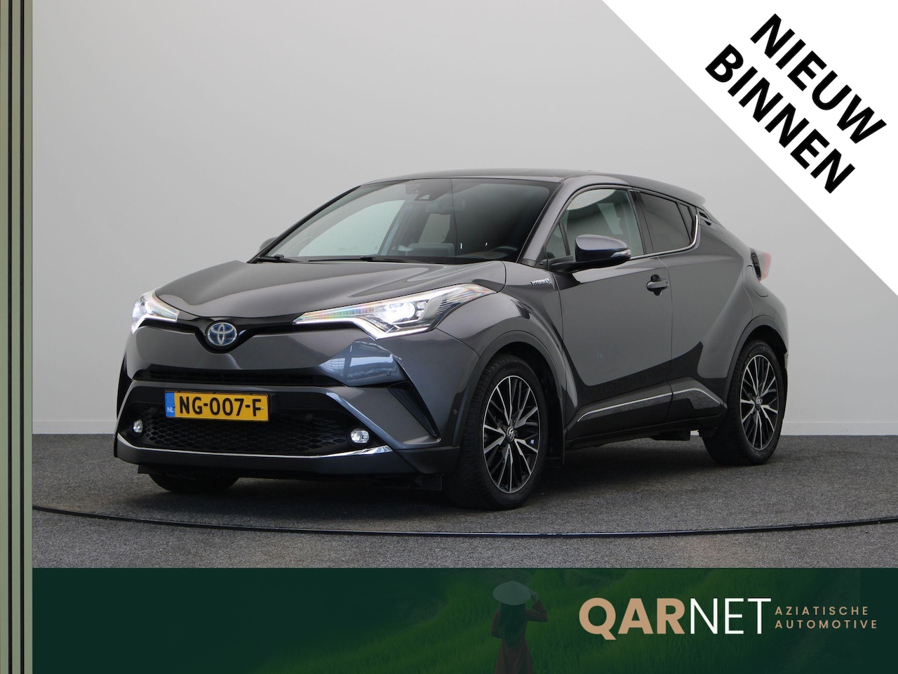 Toyota C-HR - 1.8 Hybrid Premium | Stuurwiel Verwarming | Stoelverwarming | Trekhaak | All Season Banden - AutoWereld.nl