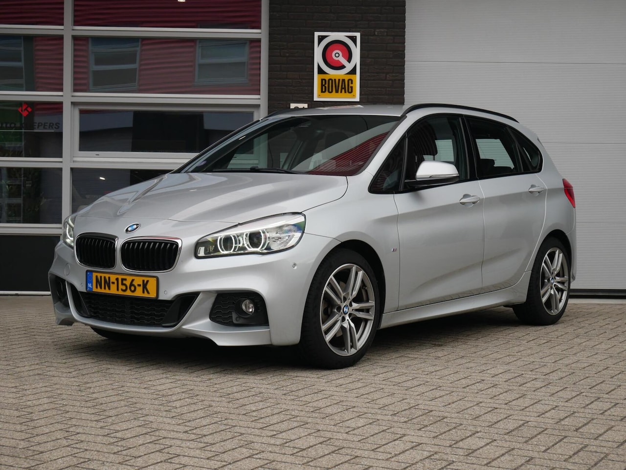 BMW 2-serie Active Tourer - 220i High Executive M Sport| Leder| Camera| Trekhaak - AutoWereld.nl
