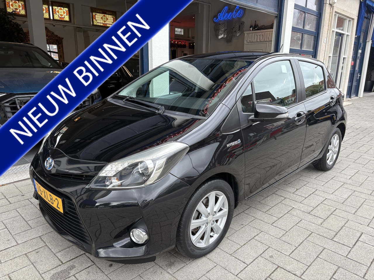 Toyota Yaris - 1.5 Full Hybrid Aspiration NAVI/CAMERA/CLIMA - AutoWereld.nl