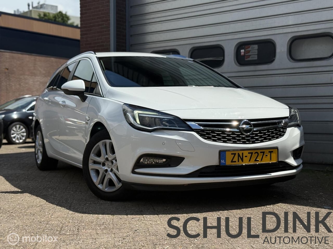 Opel Astra Sports Tourer - 1.0 Turbo 120 Jaar TREKHAAK|CAMERA - AutoWereld.nl