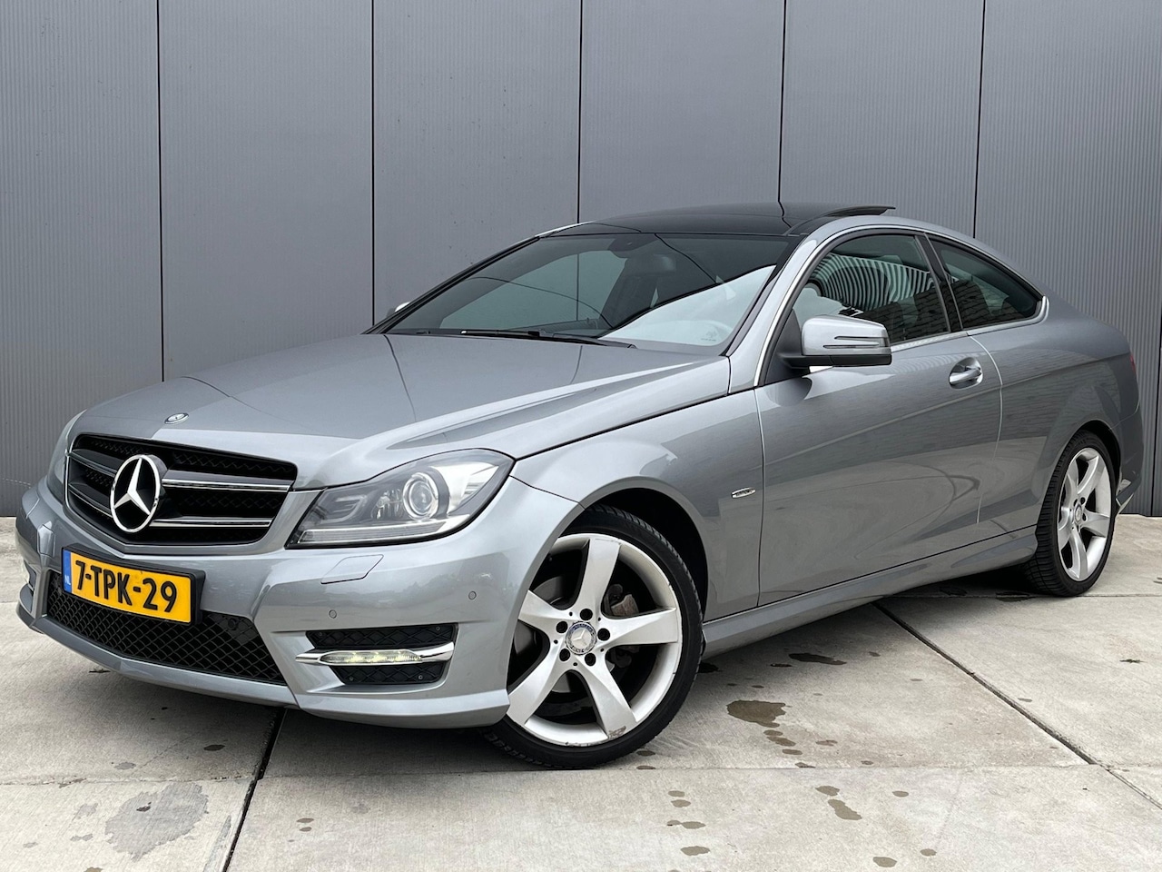 Mercedes-Benz C-klasse Coupé - 180 Ambition AMG | Panoramadak | Xenon | - AutoWereld.nl
