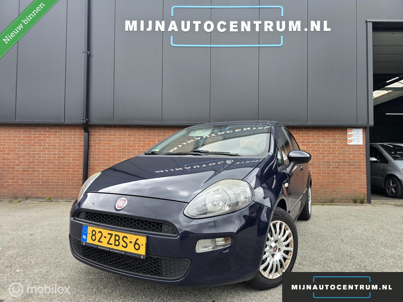 Fiat Punto Evo - 1.3 M-Jet Easy / NAP / AIRCO / APK - AutoWereld.nl