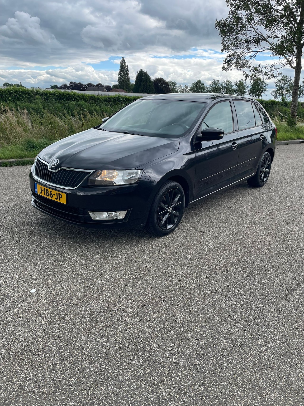 Skoda Rapid Spaceback - 1.2 TSI Greentech Style - AutoWereld.nl