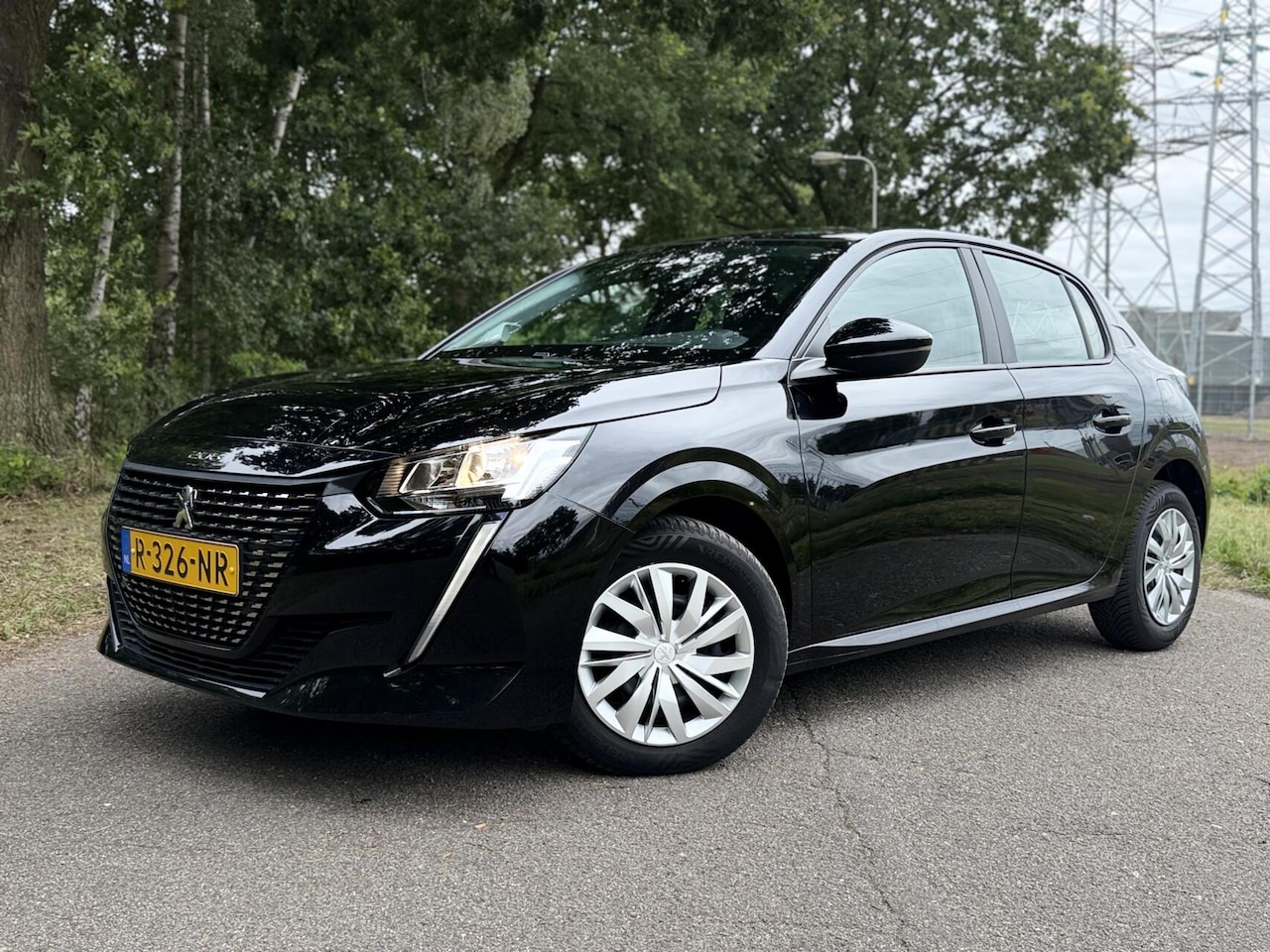 Peugeot 208 - 1.2 PureTech CarPlay Airco DAB+ NAP ✅ - AutoWereld.nl