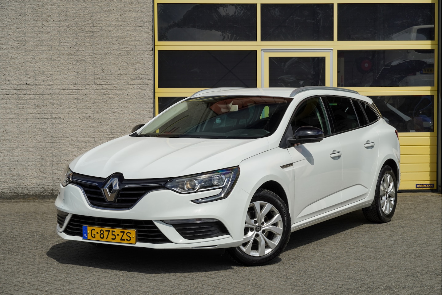 Renault Mégane Estate - 1.3 TCe Limited BJ2020 Lmv 16" | Led | Pdc | Keyless entry | App-Connect | Navi | Climate - AutoWereld.nl