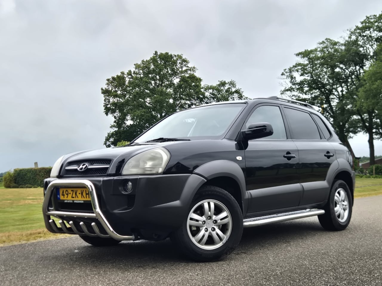 Hyundai Tucson - 2.0i Style 2.0i Style - AutoWereld.nl
