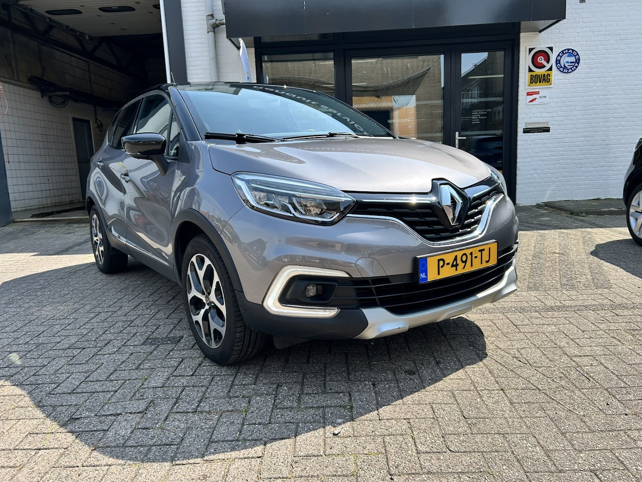 Renault Captur - 0.9 TCe Intens | NAVIGATIE | PARKEERSENSOREN | BLUETOOTH | KEYLESS ENTRY | TREKHAAK | NET - AutoWereld.nl