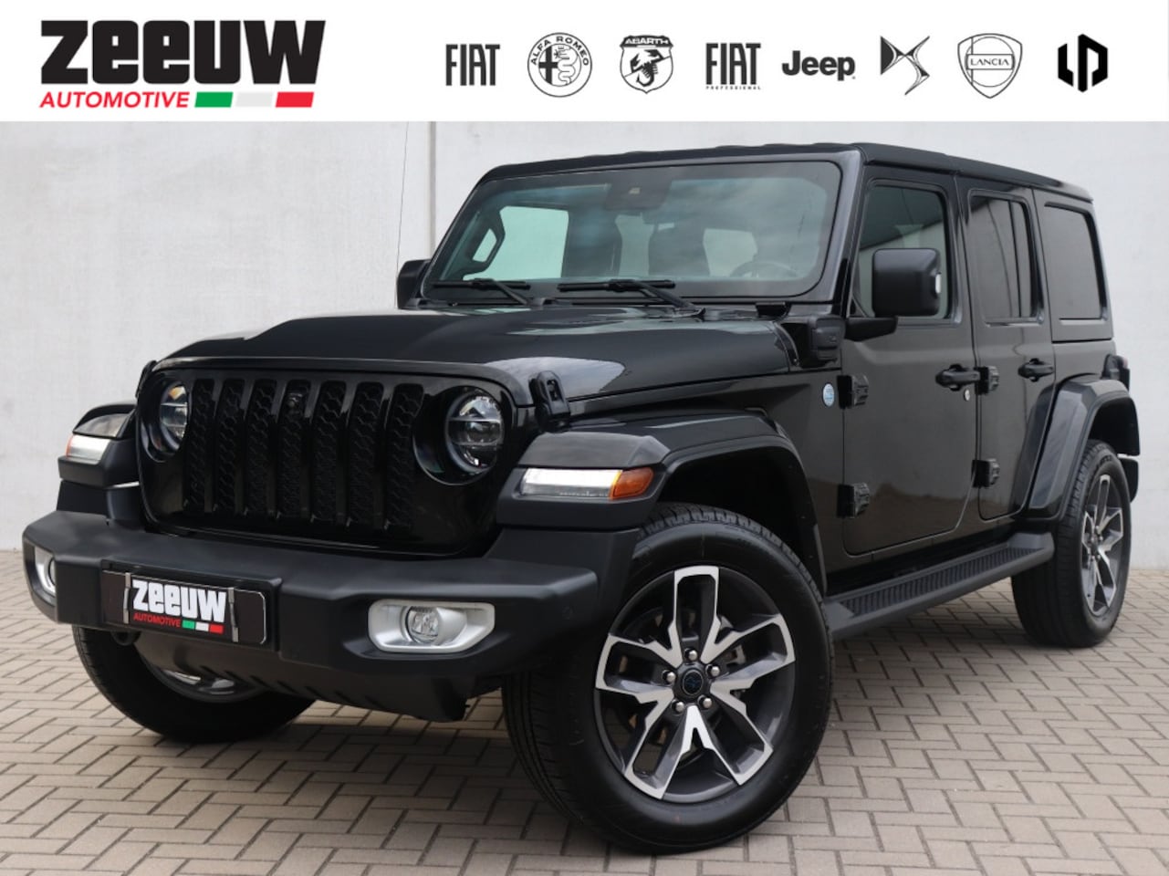 Jeep Wrangler Unlimited - 4xe 380 PK Sahara | Leder | Camera | Navi | Carplay | 20" - AutoWereld.nl