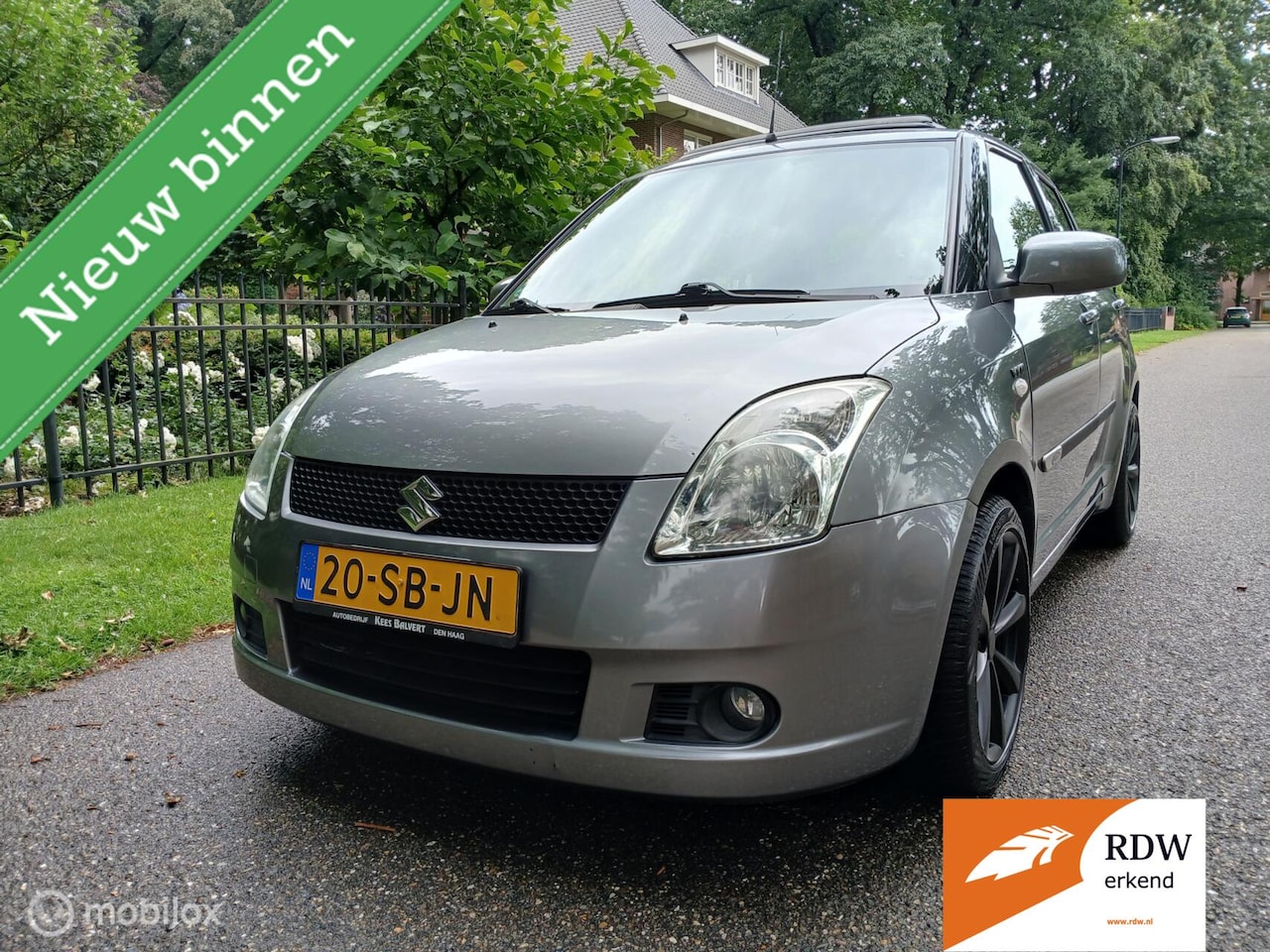 Suzuki Swift - 1.5 automaat panorama dak airco - AutoWereld.nl