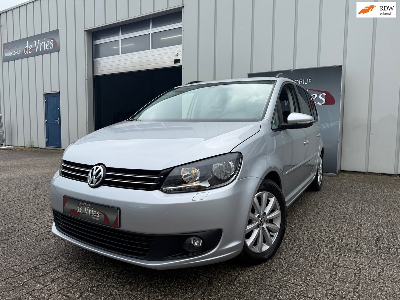 Volkswagen Touran - 1.4 TSI Comfortline 7 Persoons! / Airco / Navi / Stoelverw. / PDC / Trekhaak - AutoWereld.nl