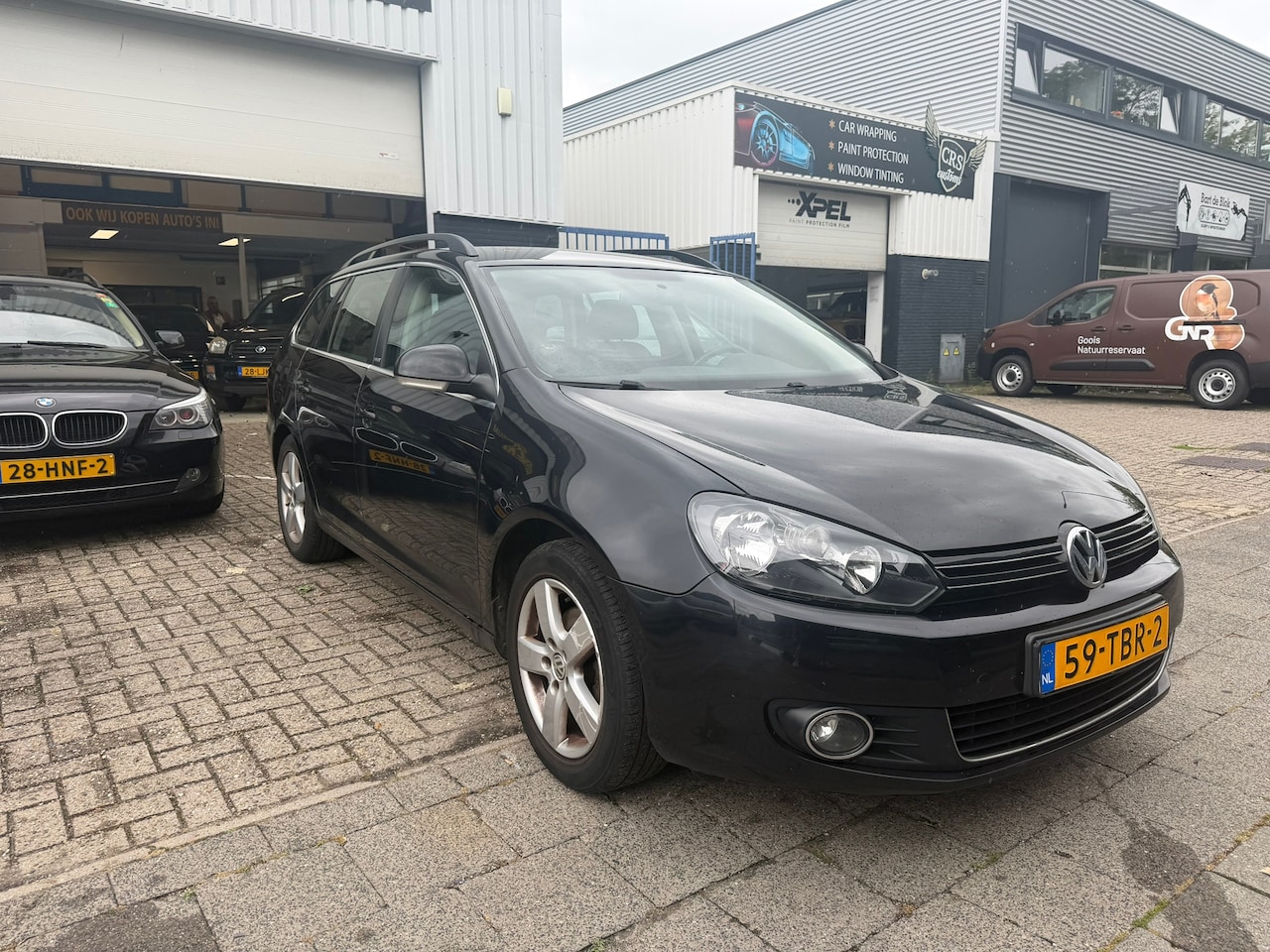 Volkswagen Golf Variant - 1.6 TDI Style BlueMotion AUTOMAAT - AutoWereld.nl