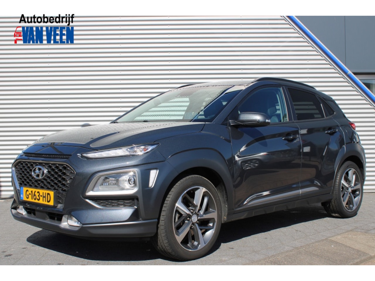Hyundai Kona - 1.0 T-GDI Premium | Trekhaak | Leder | HUD | Navigatie - AutoWereld.nl