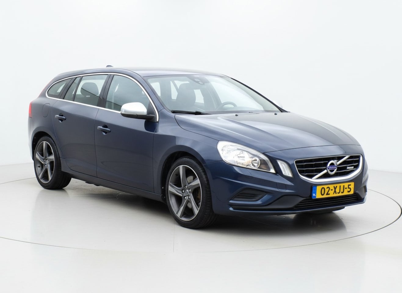 Volvo V60 - 1.6 T3 R-Design|Navi|Cruise|Trekhaak|PDC|BT|Clima - AutoWereld.nl