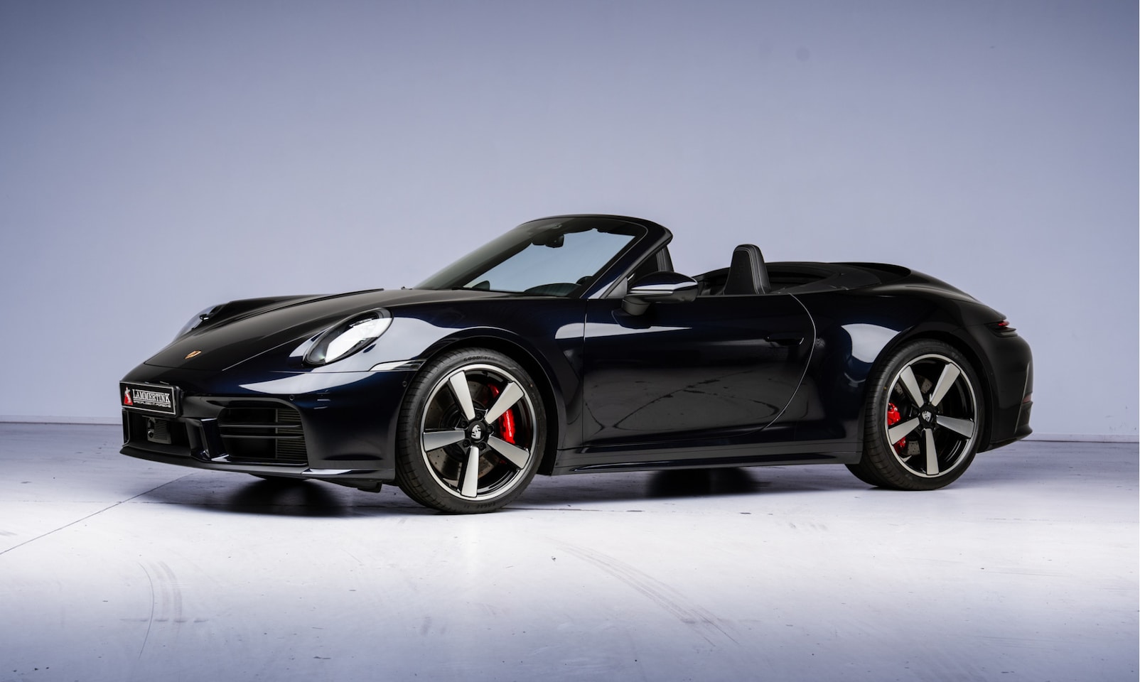 Porsche 911 Cabrio - 3.0 Carrera S Carbonblackmetallic | Nieuwprijs: €278.497 - AutoWereld.nl