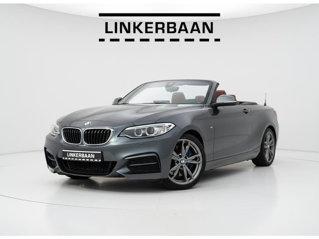 BMW 2-serie Cabrio - M235i Cabrio High Executive | Leder | H&K | Camera | Navi - AutoWereld.nl