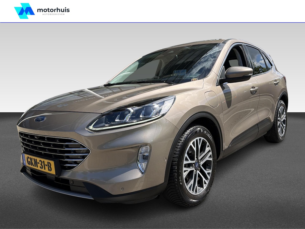 Ford Kuga - 2.5 PHEV Titanium | Achterbank verwarmd | Achteruitrij assistent | Apple Carplay/Android A - AutoWereld.nl