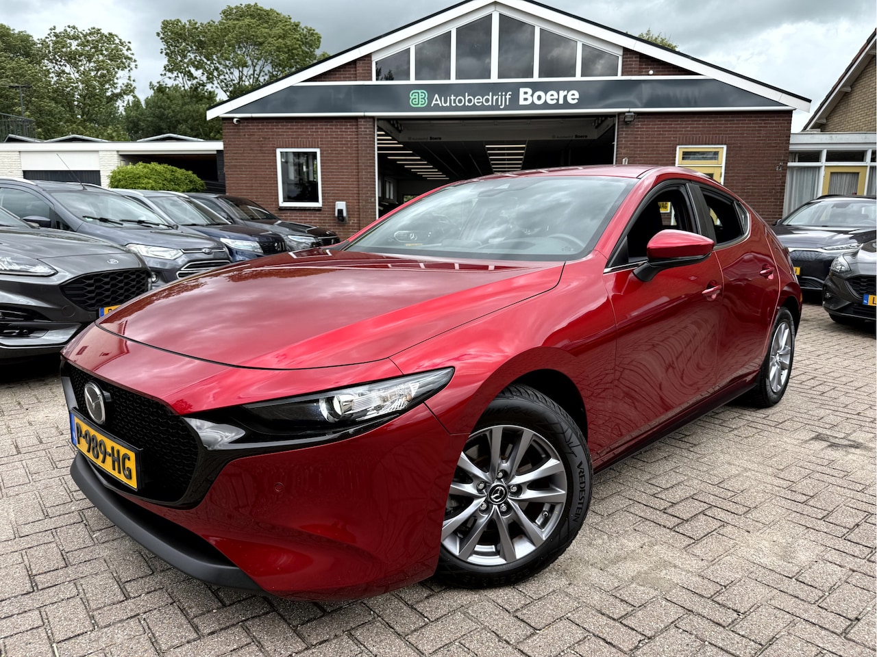 Mazda 3 - 2.0 e-SkyActiv-G M Hybrid Comfort Navi, Camera, App Connect - AutoWereld.nl