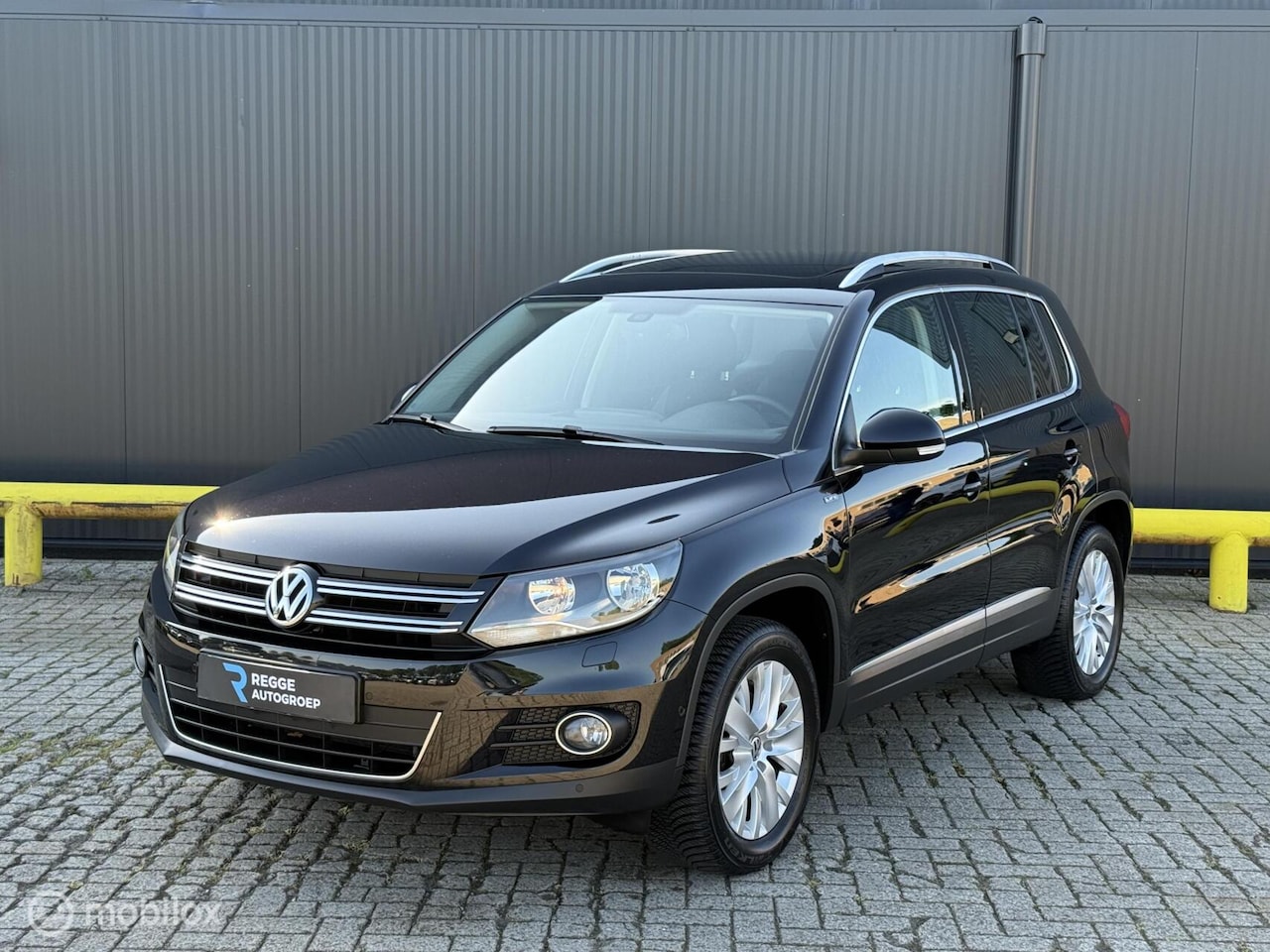 Volkswagen Tiguan - 1.4 TSI Sport&Style NIEUWSTAAT | PANODAK - AutoWereld.nl
