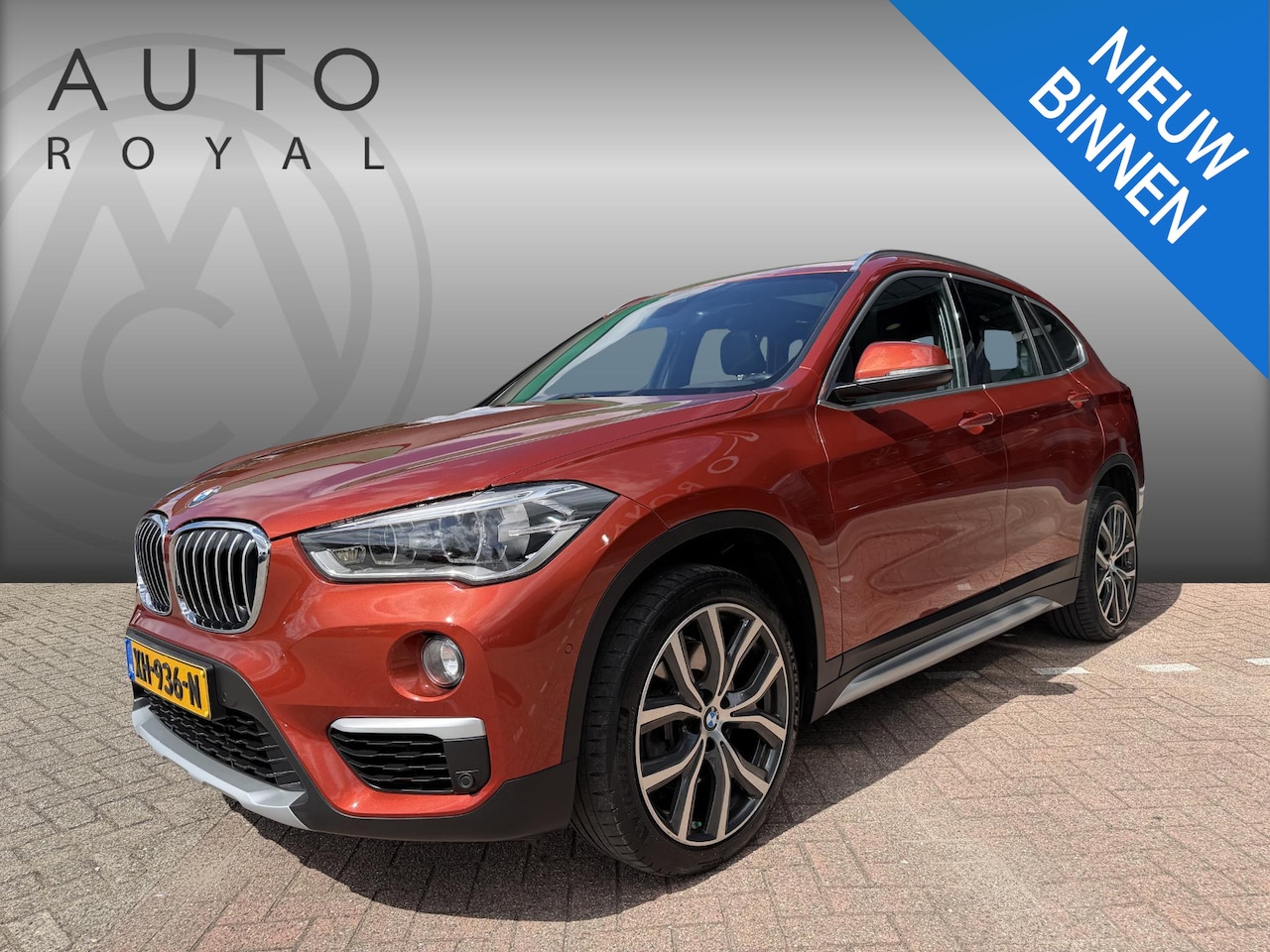 BMW X1 - sDrive20i Orange Edition II AUTOMAAT| LEDER SPORT INTERIEUR| PANORAMADAK| CAMERA| NAVIGATI - AutoWereld.nl