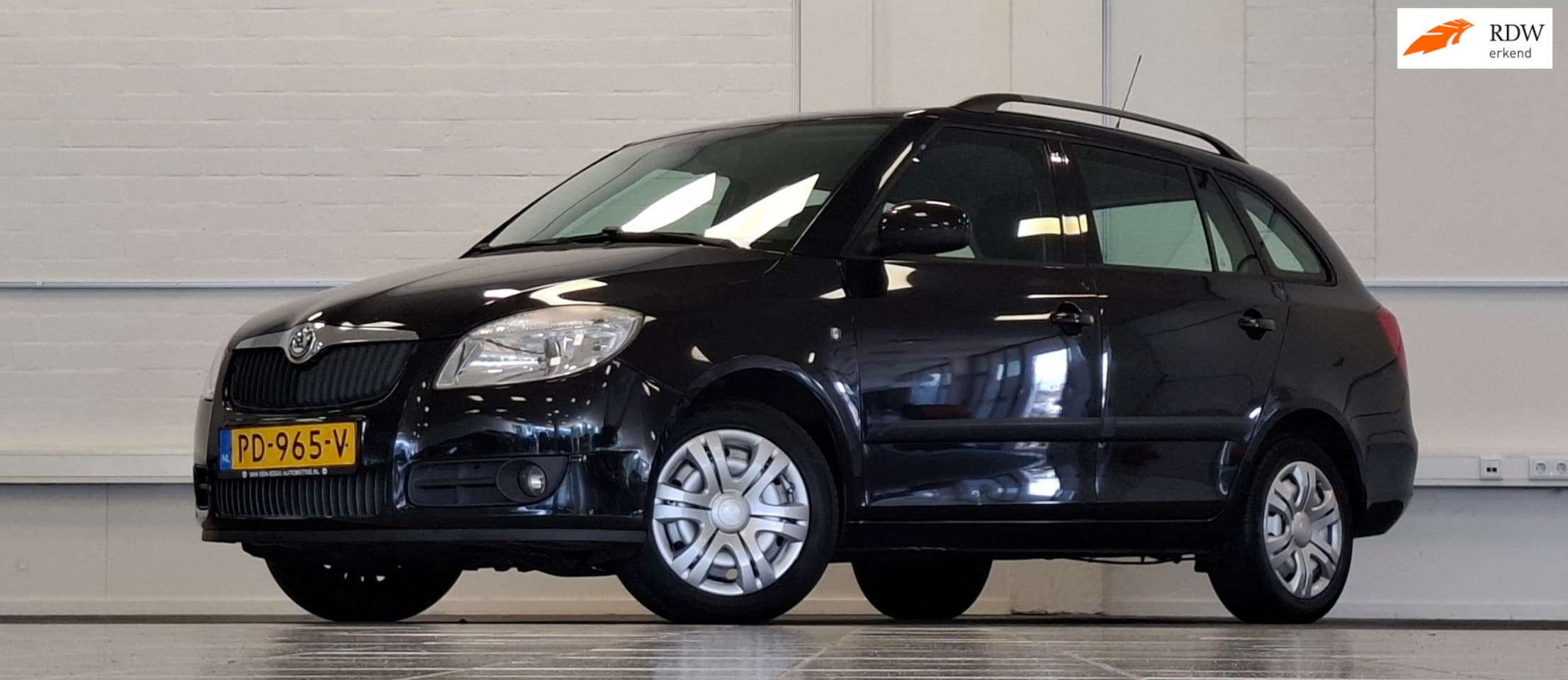 Skoda Fabia Combi - 1.2i 12V Ambition Airco Garantie APK 23-03-2027 - AutoWereld.nl