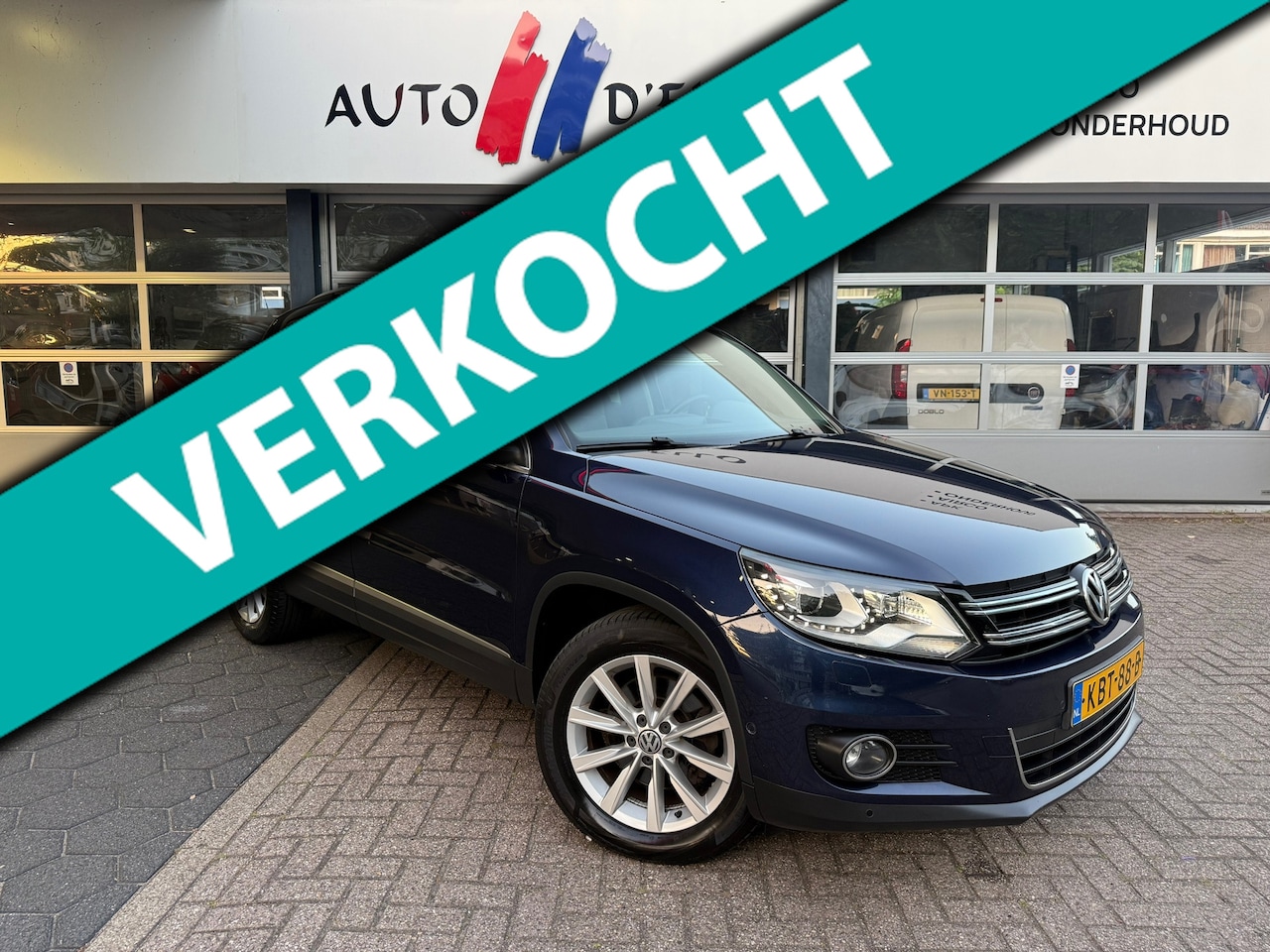 Volkswagen Tiguan - 2.0 TDI Sport&Style AIRCO|CAMERA|NAVI|PARKASSIST - AutoWereld.nl